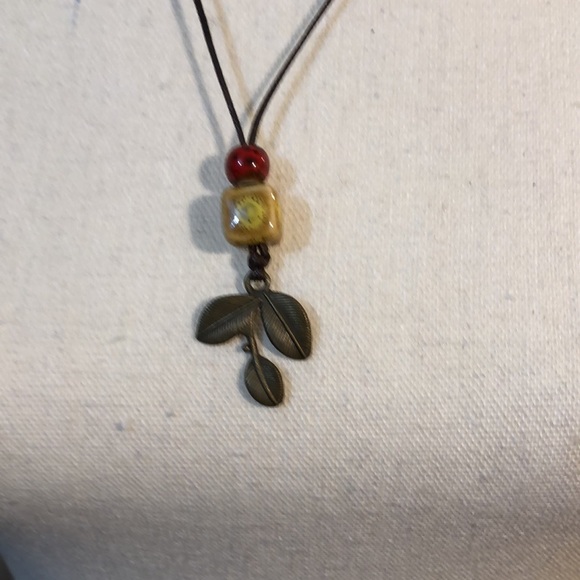 Beaded Necklace with adjustable leather strap - Picture 3 of 5